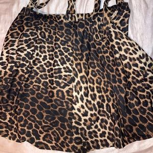 Boohoo skirt with suspenders. Can be tucked in if want to wear as regular